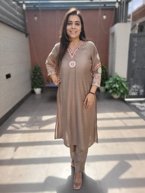 The PS-015 Raw Silk 2PC Set is crafted from luxurious raw silk, offering a smooth, breathable, and elegant feel. The kurta features delicate zari and embroidery work, paired with a coordinated bottom for a complete and refined ensemble. Ideal for casual outings, festive occasions, and semi-formal gatherings, this 2-piece set combines traditional artistry with contemporary style. Available Sizes: 38 | 40 | 42 | 44 | 46 Available Colors: (Add Colors if known) Care Instructions: Gentle hand wash separately in cold water; line dry in shade to preserve fabric texture and delicate embroidery.